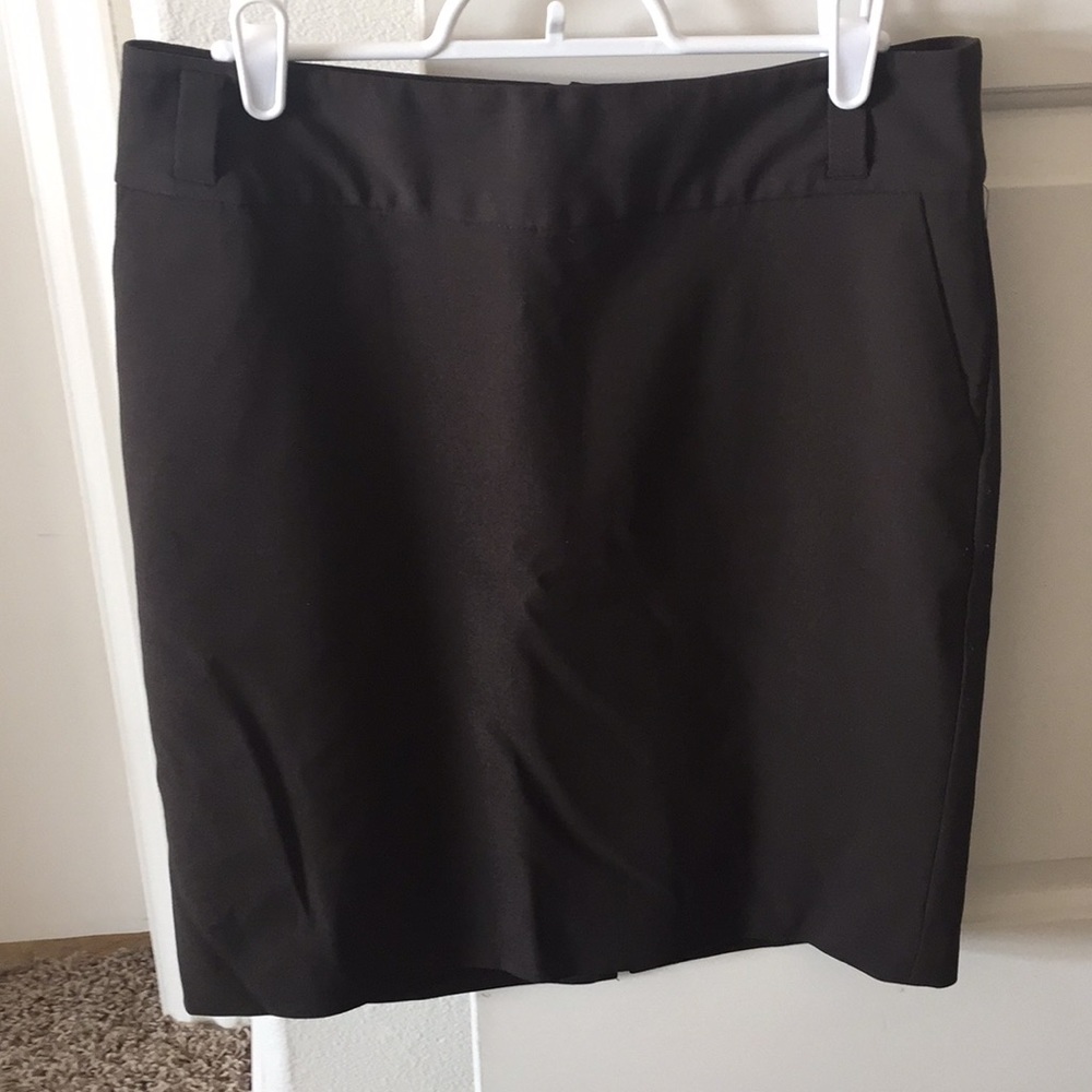 Wool knee length Skirt. has little tear on back